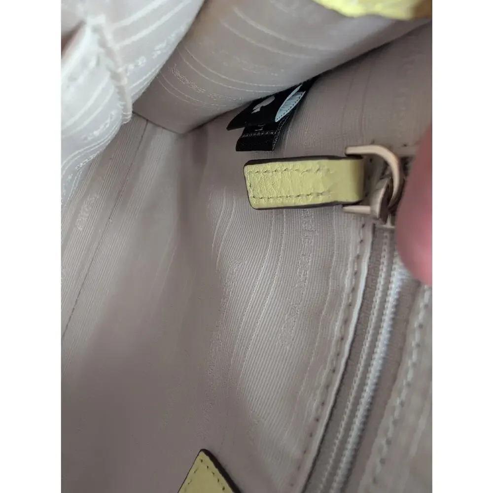 Kate Spade NY Suns Out Pale Yellow Pebbled Leather Wallet Crossbody Bag